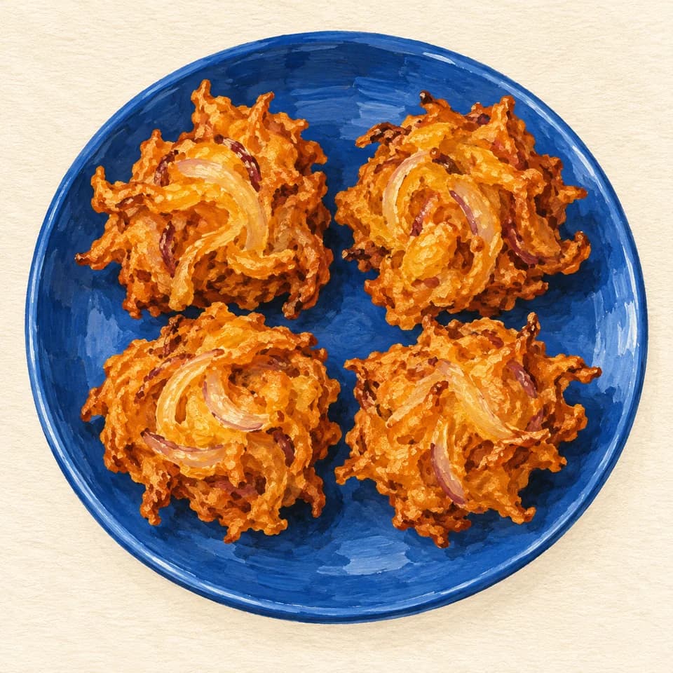 Editorial illustration of Onion Pakoda — four pieces
